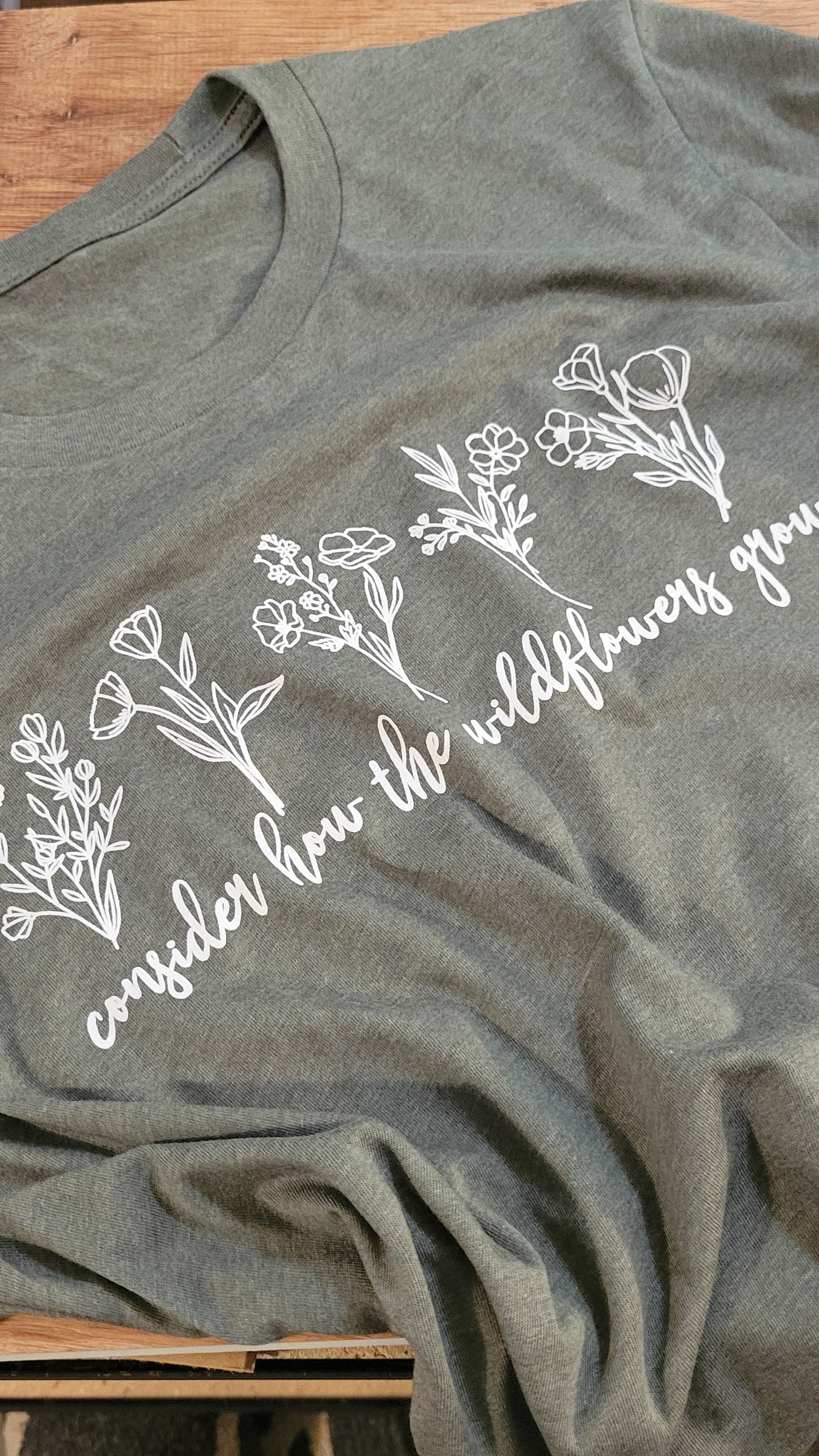 Consider How the Wildflowers Grow Women's T-Shirt . Christian Faith Apparel